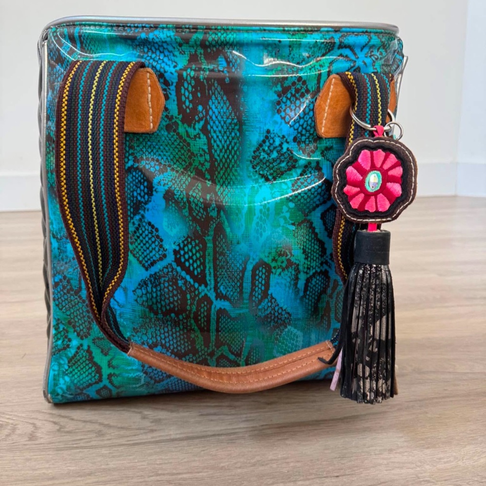 Consuela Cade chicka blue snake skin print lightly used